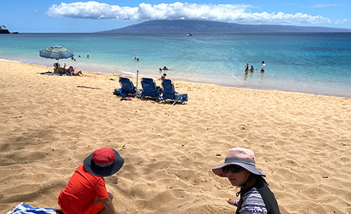 Family snorkeling and exploring Maui Hawaii beaches
